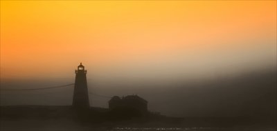 Misty sunrise. US Coast Guard light house Narragansett RI.