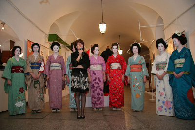The Director with Maiko welcomes the guests