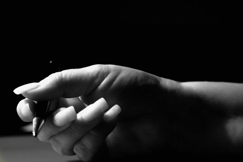 pen in hand - b&w