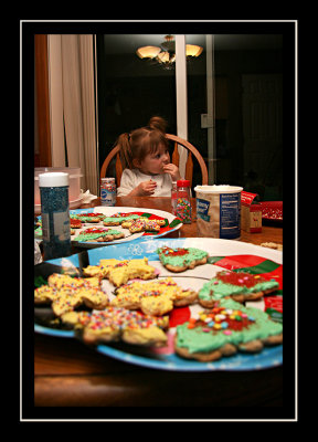 Cookie decorating (aka trying to keep Norah from eating everything and dumping all the sprinkles on one cookie)