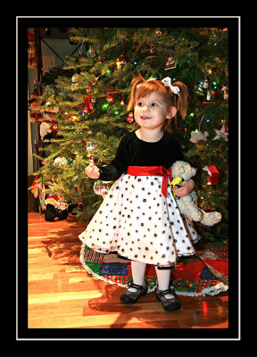 Modeling her Christmas dress (with her tennis shoes of course)