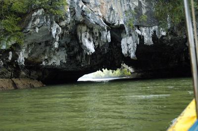 Through limestone passages beneath the cliffs