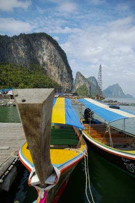 Colorful boats anchored, local version of a truck stop