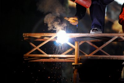 Welders at the set to provide 'sparks' for the film