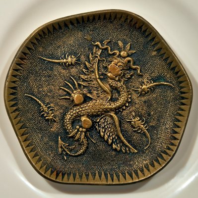 Dragon On Metal Plate