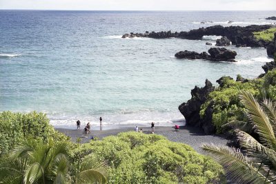 Black sand beach in Maui island Reala