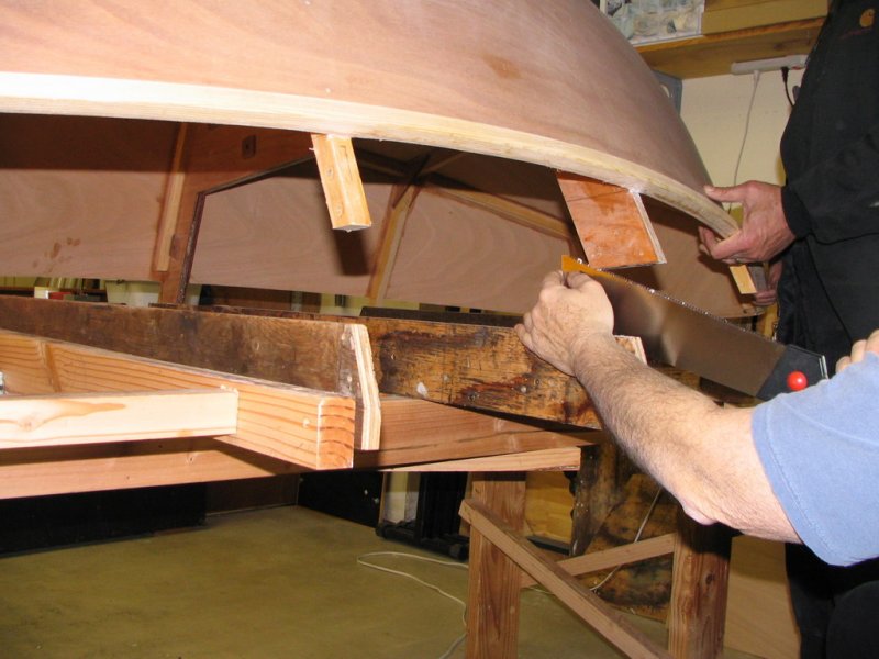 Time to slice the hull, here using the saw to pre-clean the kerf slot of shim material.