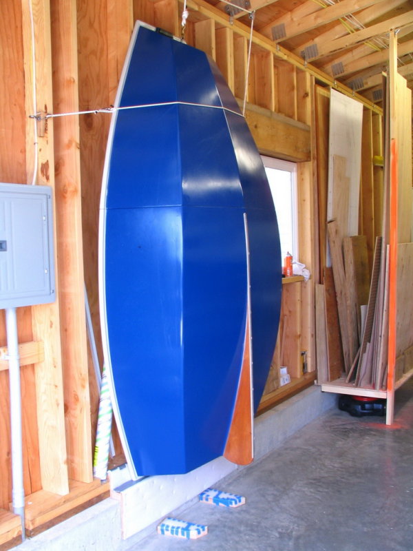 Hung the dinghy against the shed wall, off the bow eye.