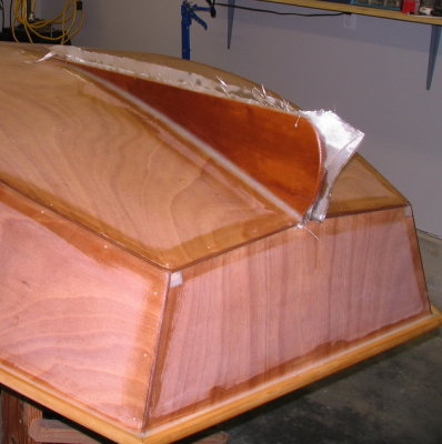Combined glue job to the hull with glass over the fillet and up the sides.