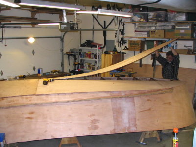 Plank is laid down after support pins are removed.