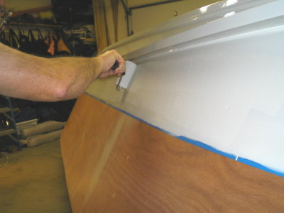 Five coats of two-part LPU are rolled on and tipped out.  Very durable, water-based marine coating.