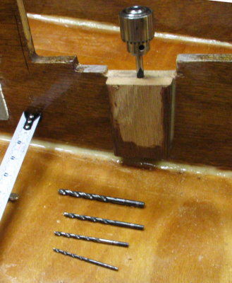 The frame 6 lag screw holes were placed partially under the top of the frame; hand-twisting bits enlarged holes to 5/16.