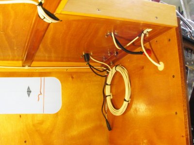 Cables forward of the helm.  L to R:  GPS/sounder;  GPS antenna; VHF cables; allaround power.