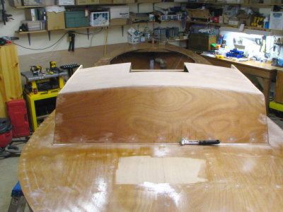 Hatch and door cut; cuddy exterior sanded, ready for glassing the top.