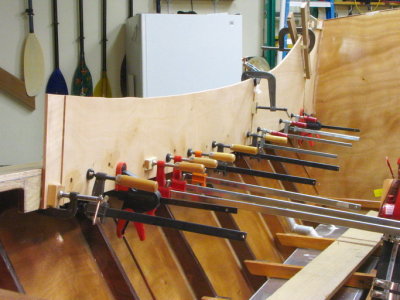 Clamp up first layer of 3/8ths ply; every clamp in the shop needed to produce squeezeout!