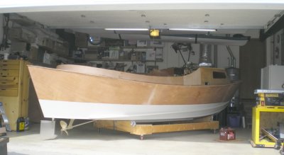 Oblique shot of completed coaming as boat is turned, prior to engine test (see below).