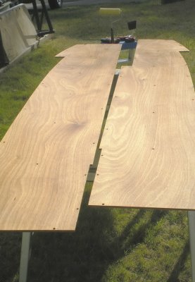Saturation coat on side floorboards (8 feet each). A nice sunny day made this a pleasant task.