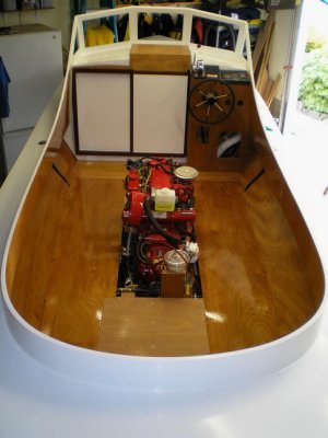 Overall view of cockpit from the rear; fresh floorboards.