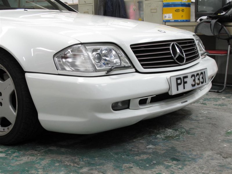 Original AMG spoiler and side skirt