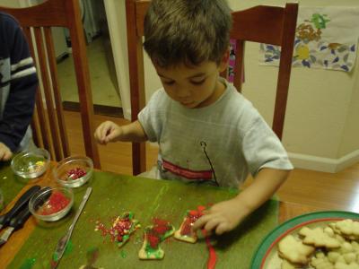 Cooper decorating cookies