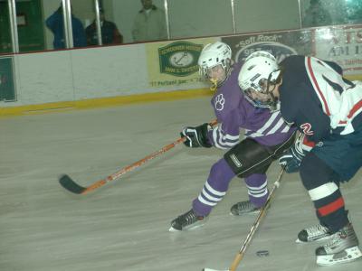 Joey Bergeron works Oyster River player.jpg