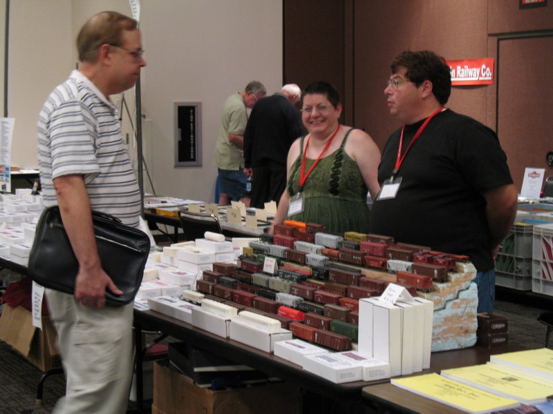 Pat Wider, left, at the Funaro & Camerlengo Table.  Steve Funaro is at right.