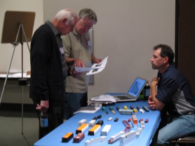 Ed Hawkins (center) Explaining Details to Frank Angstead of Intermountain.