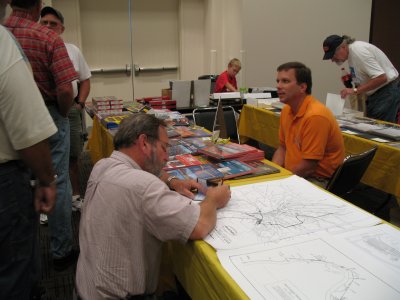 Paul Fries (seated in orange shirt) of Red Board Hobbies