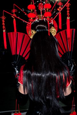 Burlesque dancer in Chinese attire.