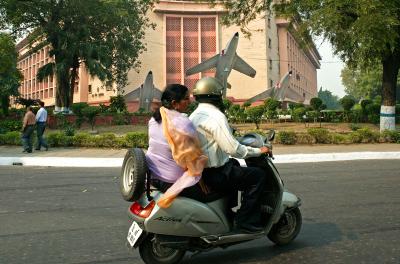 Motor scooter in front of defense building, New Delhi.