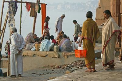 Praying on Manikarnika ghat, by the Ganges, Varanasi.