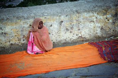 Hoping for small offerings of grain or money, on the road to Galta temple, near Jaipur.