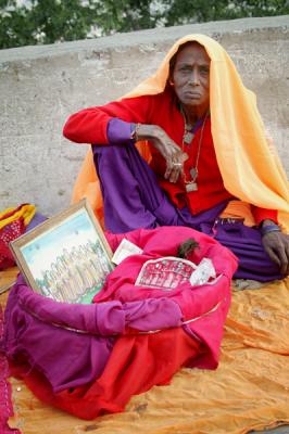Seeking offerings on the road to Galta temple, near Jaipur.