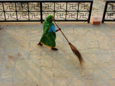 Sweeping endless dust, Varanasi.