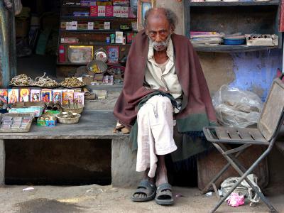 Tending a stall on the street, Pushkar.
