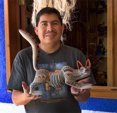 Jacobo Angeles with carving, near Oaxaca.