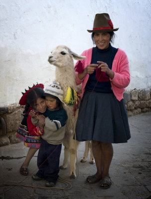 Mother, children and llama in San Blas.