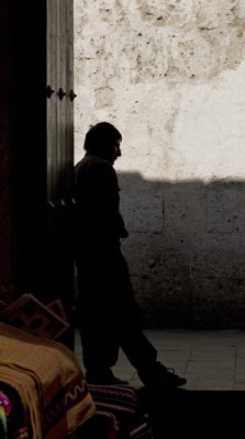 Man in doorway in a store, Arequipa.