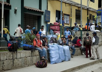Peruvian workers waiting for the train to take them back to Cusco from Aguas Calientes.