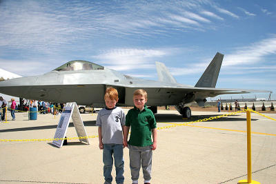 Boys in Front of Dad's Jet