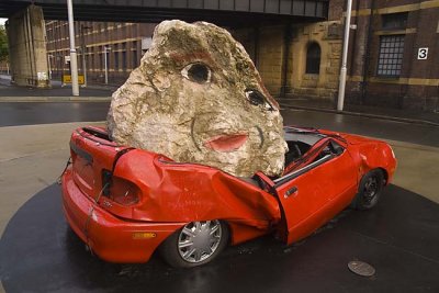 Still life with car and stone