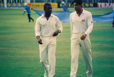 Cricket captains Richie Richardson & Wasim Akram walk in after inspecting the wicket