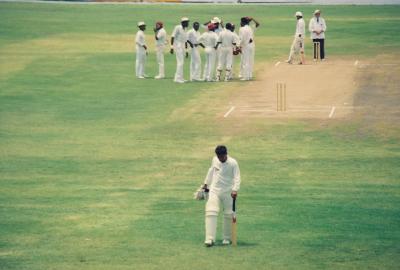 Dismissed Pakistan batsman walks off