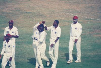 West Indian players leave the field