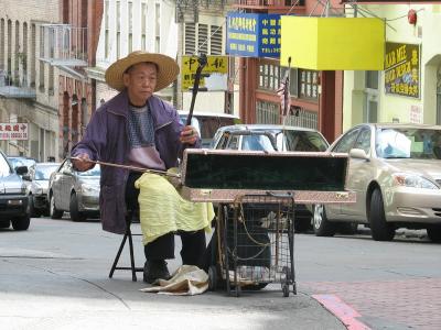 Street corner musician in Chinatown