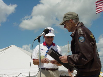 Original Memphis Bell Pilot Col. Bob Morgan, Receiving award from Retired General Fred Buckingham. 2004