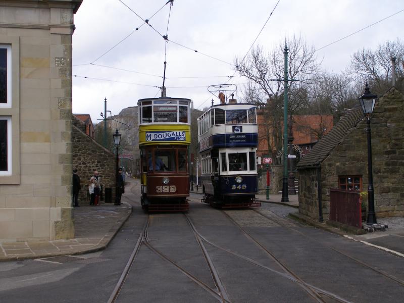 Leeds 399 passes Leeds 345 as it leaves the terminus