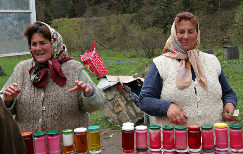 Two Vendors Selling Syrup