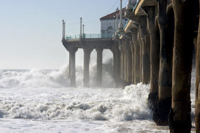 High surf pounding Manhattan Beach pier
