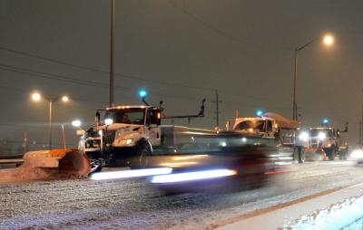 After the snow storm, plows clearing the road